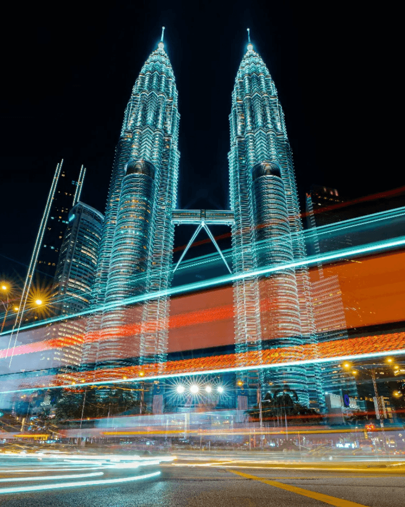 Petronas Twin Towers illuminated at night in Kuala Lumpur